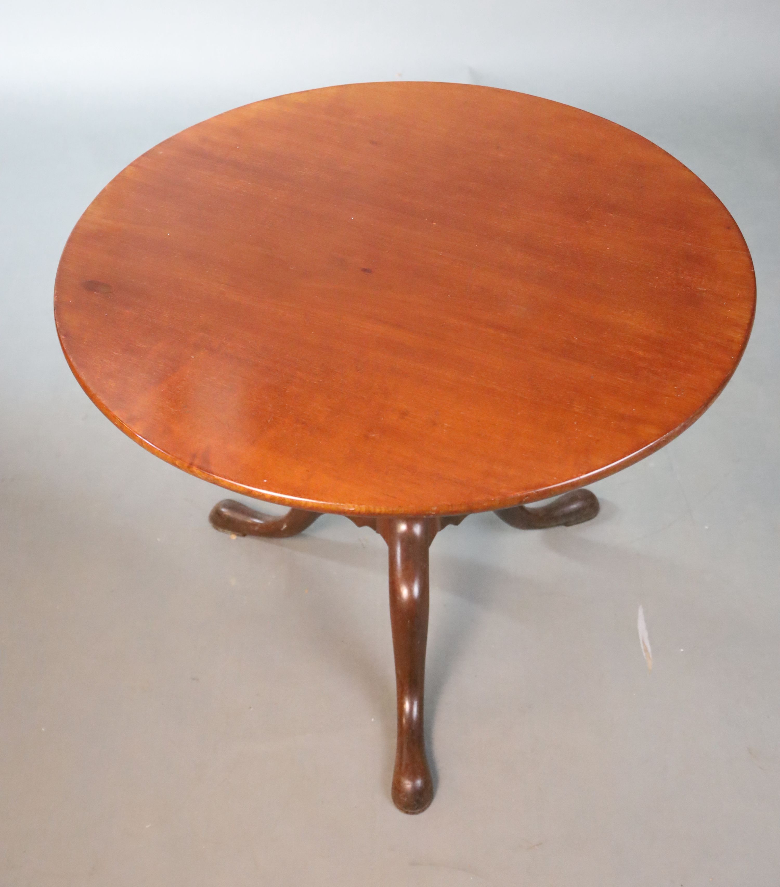 A George III mahogany tea table, Diam.121cm H.70cm